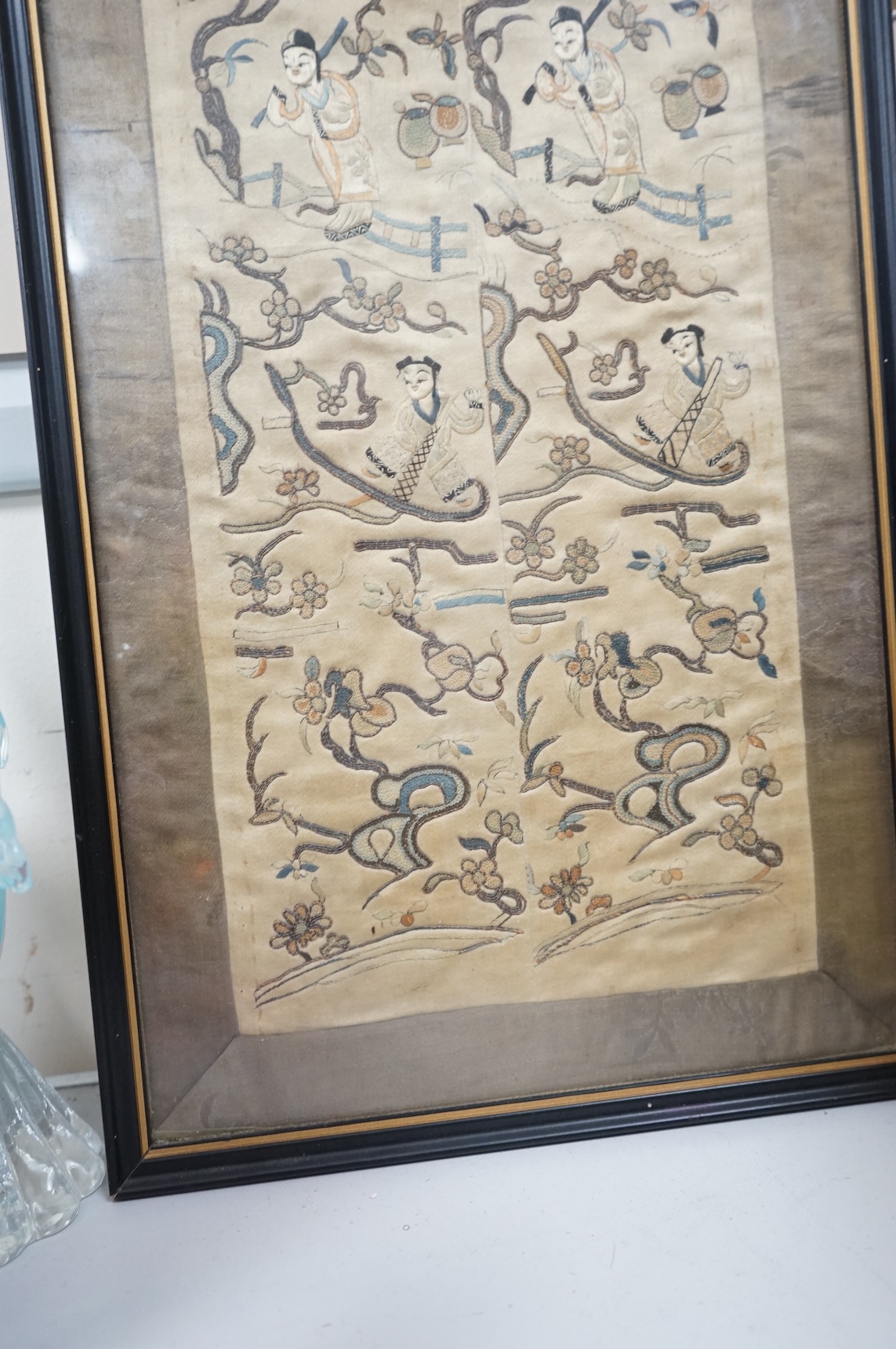 A Chinese silk embroidered sleeve panel, 48x18cm